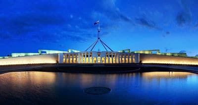 Sunset image of parliament house in Canberra.
